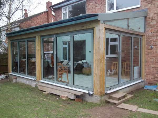 Mr V: Neston South Wirral : Self biuld project :Installtion of Cetor C1 Triple glazed Bi fold doors : Roof HWL Alumnium Thermally broken roof sytem glazed with celcius One self cleaning glass units . Roof Glass center pane U value 1. Bi fold doors .6